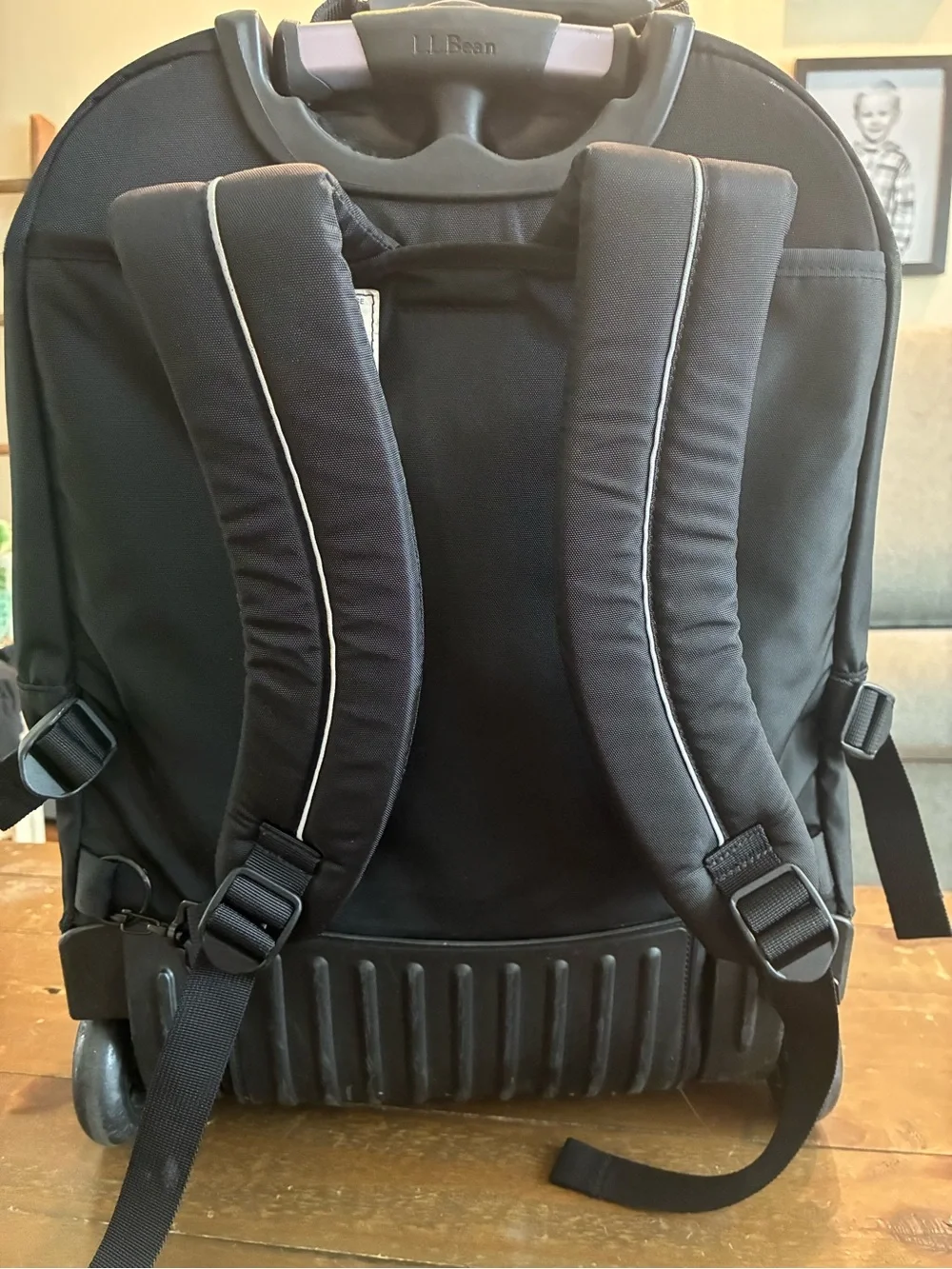 L.L. Bean Black Rolling Backpack with Silver Reflective Accent
